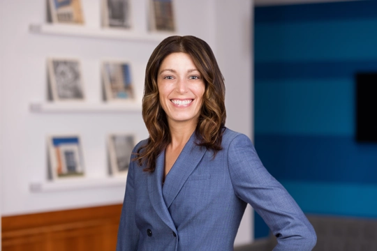 smiling person in professional attire